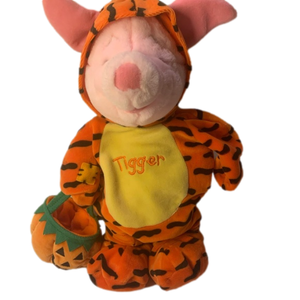 Piglet dressed as Tigger for Halloween plush
